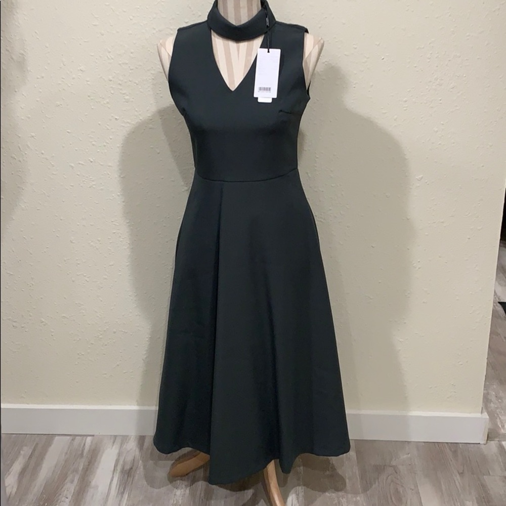 Dark green sleeveless dress